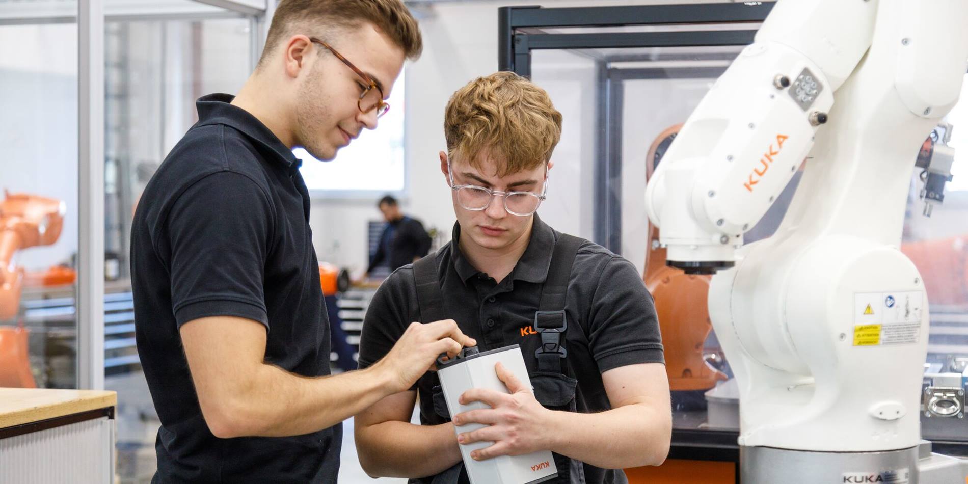 Training as a mechatronics technician: KUKA trainee at work